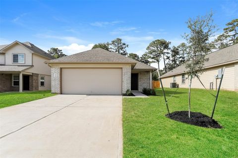 Photo of 310 Blue Crane Street, Huntsville, TX 77320 (MLS # 26472660) Photo of 310 Blue Crane Street, Huntsville, TX 77320 (MLS # 26472660)