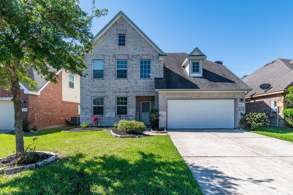 Photo of 10022 Lynnwood Drive, Baytown, TX 77521 (MLS # 49233503)