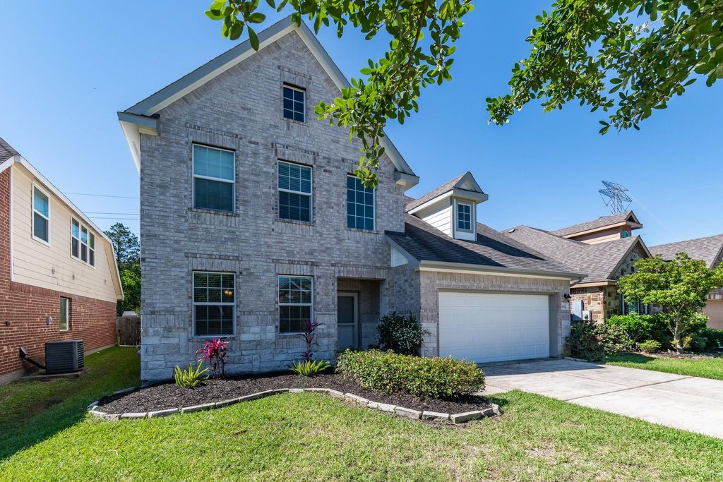 Photo of 10022 Lynnwood Drive, Baytown, TX 77521 (MLS # 49233503)