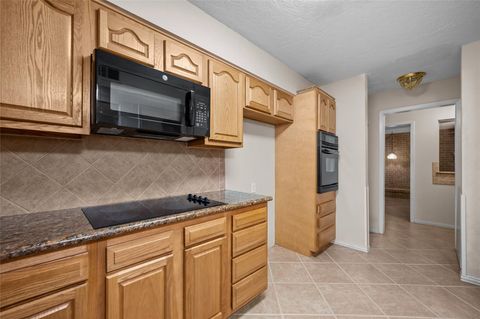 Tiny photo for 1303 Town Circle #4, Baytown, TX 77520 (MLS # 76940431)