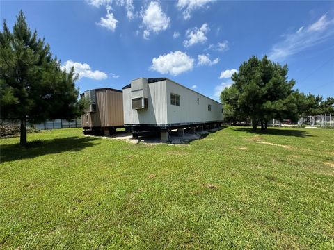 Photo of 846 County Road 3565, Cleveland, TX 77327 (MLS # 61985758)