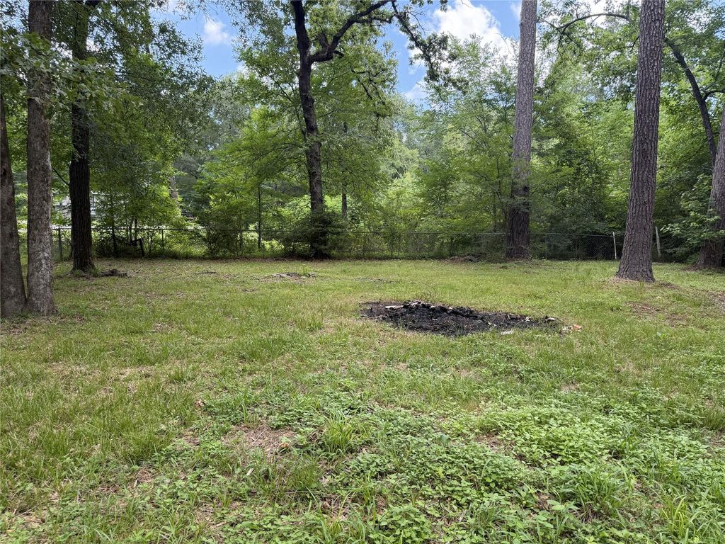 Photo of 5764 Cessna Drive, Montgomery, TX 77316 (MLS # 83129001)