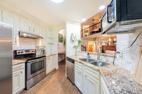 Photo of 9400 Doliver Drive #36, Houston, TX 77063 (MLS # 21452943)