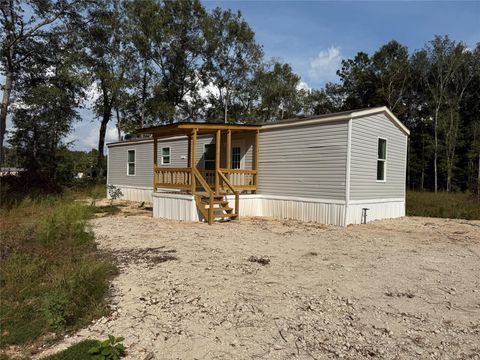 Photo of 2430 County Road 318, Cleveland, TX 77327 (MLS # 32543303) Photo of 2430 County Road 318, Cleveland, TX 77327 (MLS # 32543303)