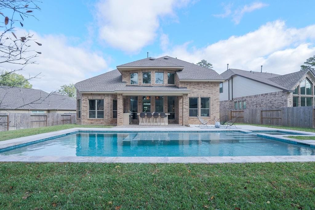 Photo of 211 Castle Combe Court, Conroe, TX 77318 (MLS # 29880045)