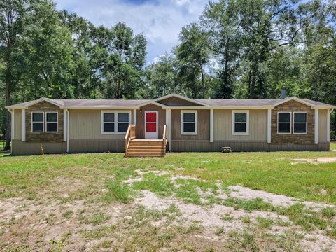 Photo of 10754 Lake Shore Drive, Conroe, TX 77303 (MLS # 13114743)