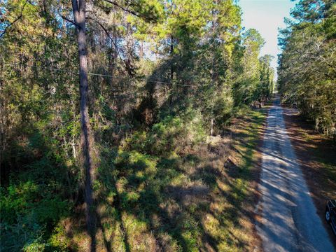 Photo of 0 County Road 2125, Cleveland, TX 77327 (MLS # 61623672)