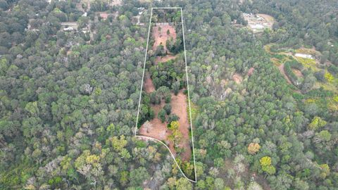 Photo of 5 Metts, Conroe, TX 77306 (MLS # 10125255)