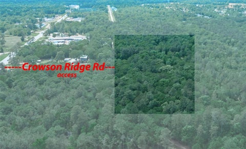 Photo of TBD Hwy 105e At Crowson Rdg Rd, Conroe, TX 77306 (MLS # 28250587)