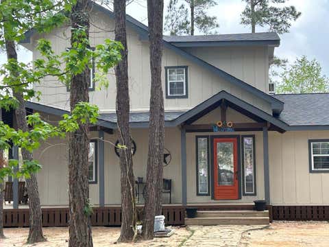 Photo of 1028 County Road 3479j, Cleveland, TX 77327 (MLS # 26267387)