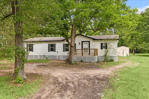 Photo of 14891 Jim Stowe Road, Conroe, TX 77302 (MLS # 86972759)