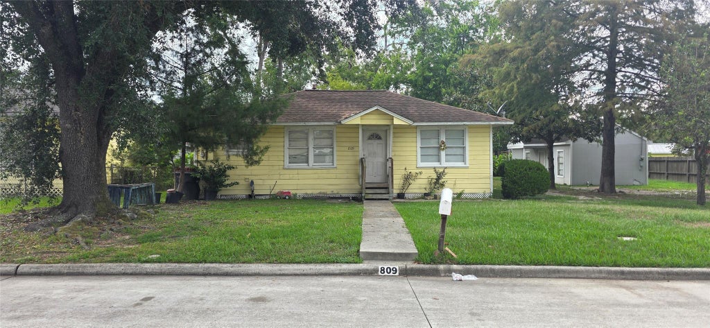 Photo of 809 N Avenue D, Humble, TX 77338 (MLS # 73076012)