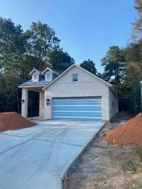 Photo of 710 Campbell Crossing Court, Willis, TX 77318 (MLS # 5984918)