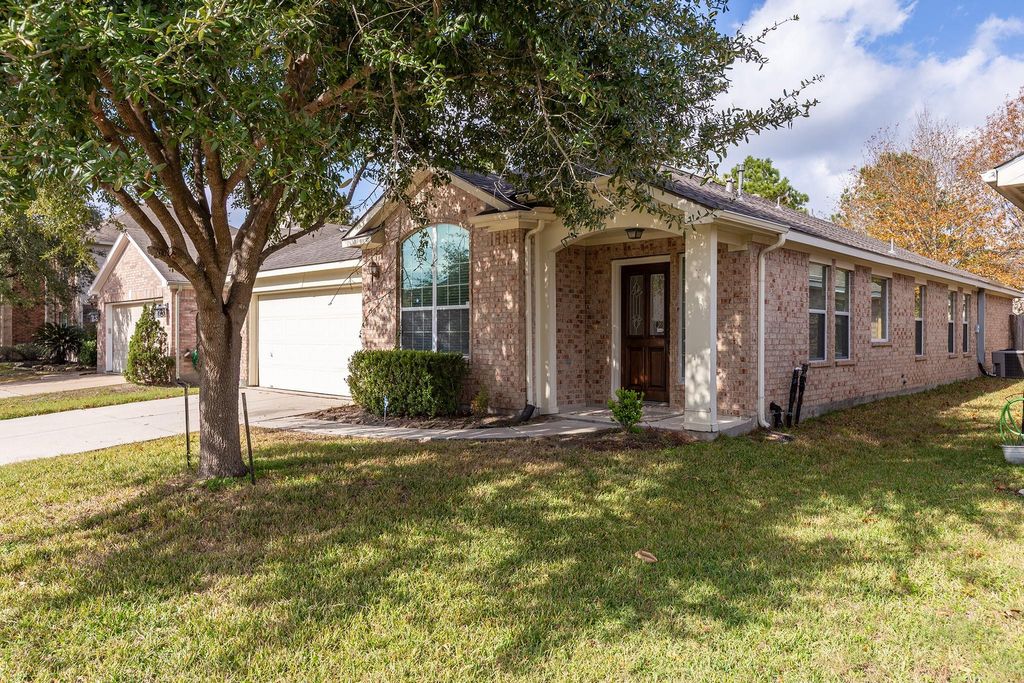 Photo of 21565 Duke Alexander Drive, Kingwood, TX 77339 (MLS # 21972512)