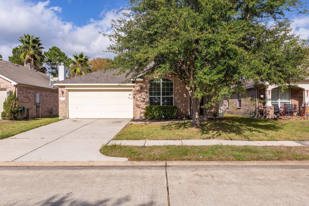 Photo of 21565 Duke Alexander Drive, Kingwood, TX 77339 (MLS # 21972512)