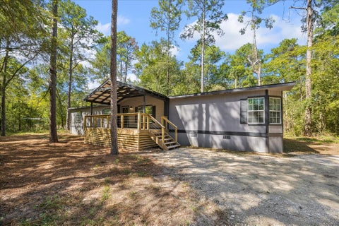 Photo of 12228 Thornwood Drive, Plantersville, TX 77363 (MLS # 59365471)