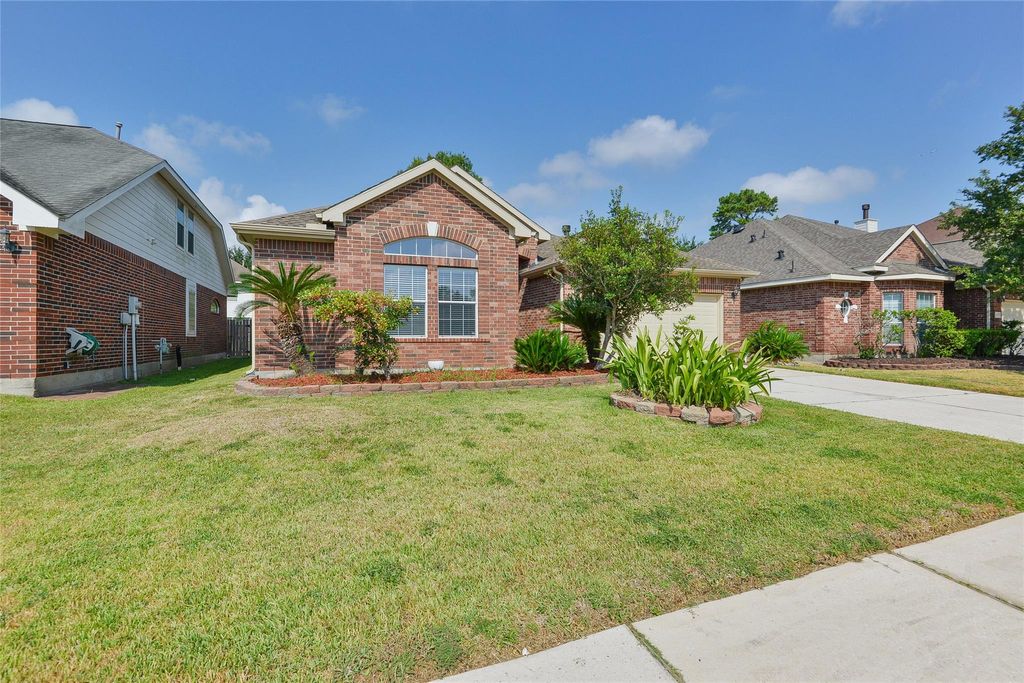 Photo of 18411 Atasca Woods Trace, Humble, TX 77346 (MLS # 10292117)