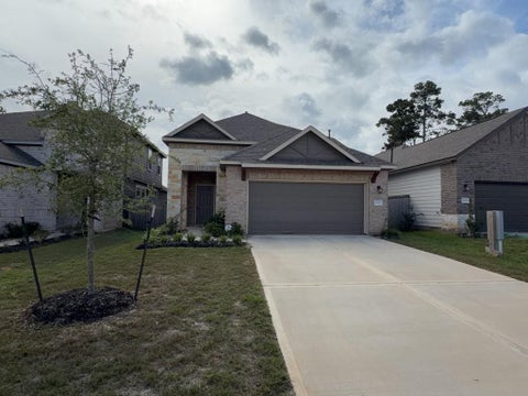 Photo of 9392 Hard Rock Road, Conroe, TX 77303 (MLS # 63778402)