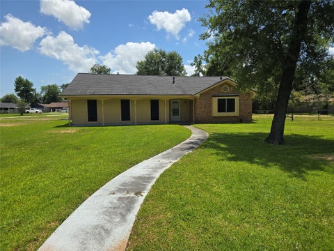 Photo of 435 Rolling Wood Road, Baytown, TX 77520 (MLS # 46656941)