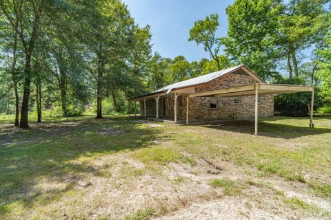 Photo of 917 County Road 331, Cleveland, TX 77327 (MLS # 10679116)