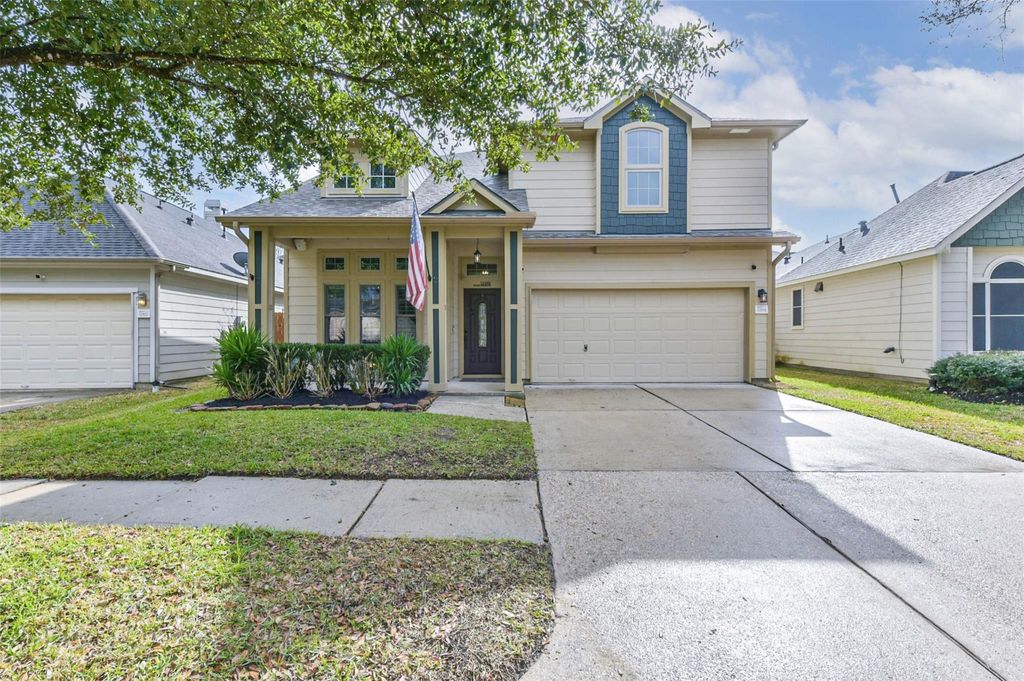 Photo of 12918 Redbud Shores Lane, Houston, TX 77044 (MLS # 95131496)