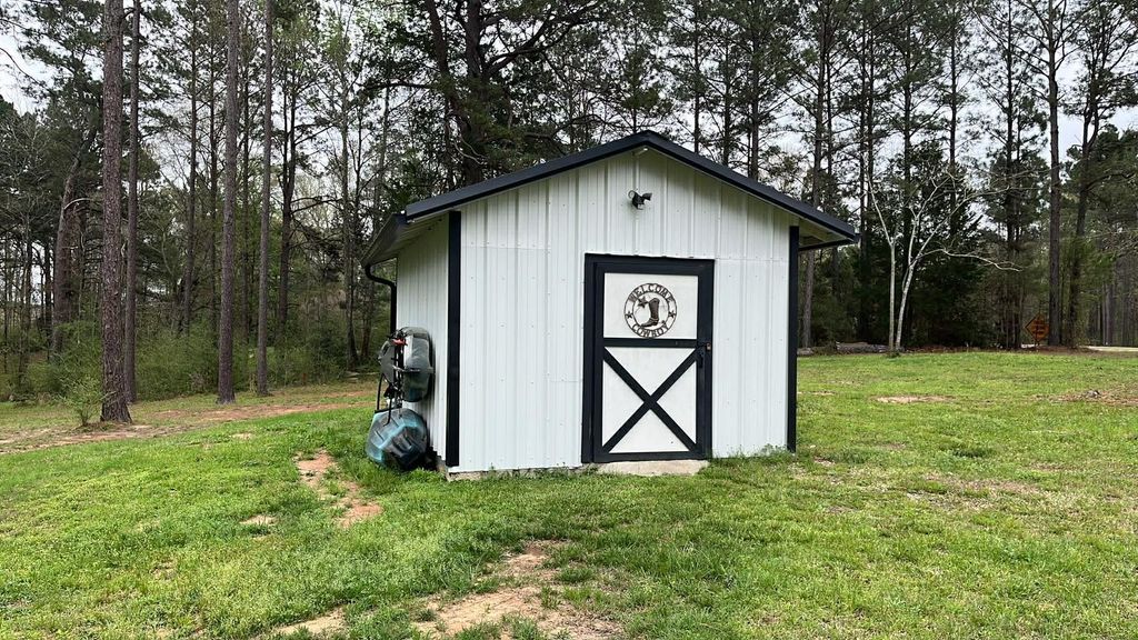 Photo of 1569 Fm 1746, Woodville, TX 75979 (MLS # 40766874)