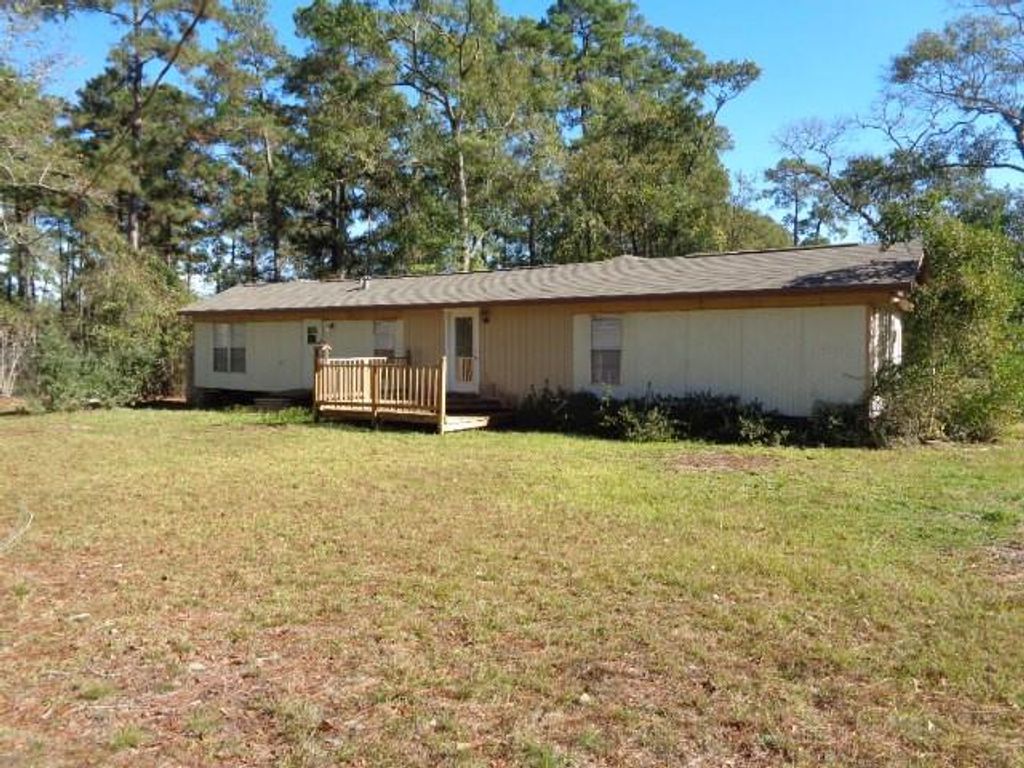Photo of 7521 Old Highway 105 W, Conroe, TX 77304 (MLS # 54103676)