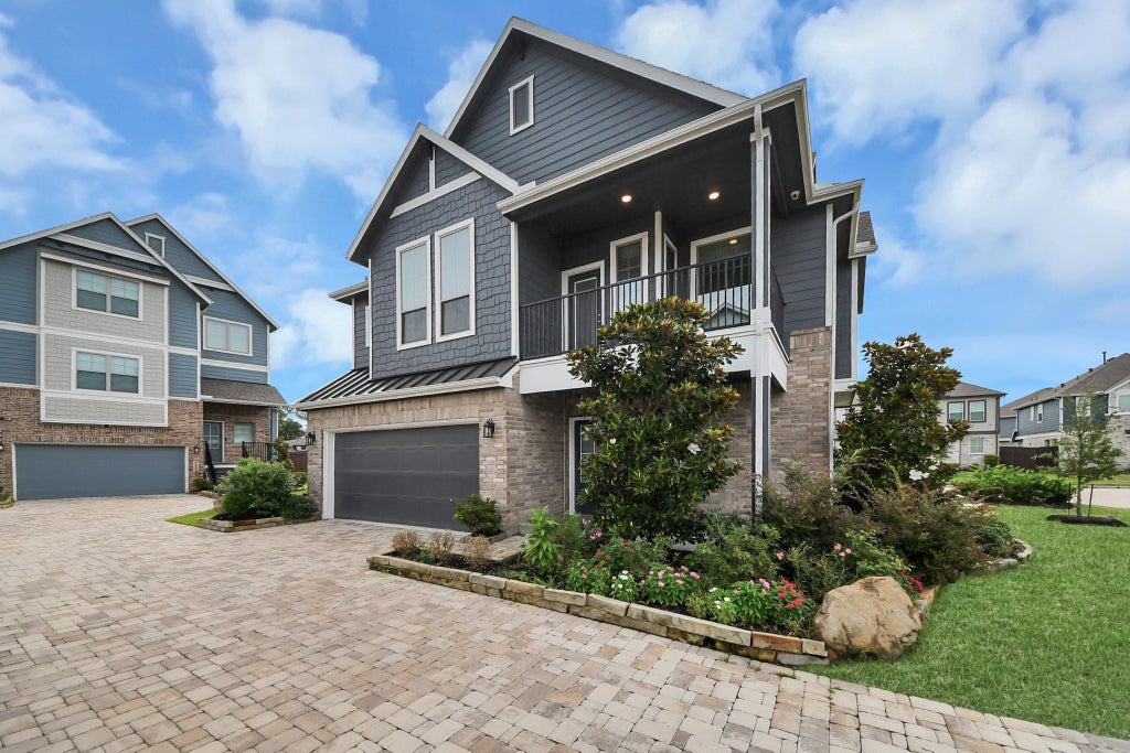 Photo of 11831 Marbled White Lane, Humble, TX 77346 (MLS # 95551281)