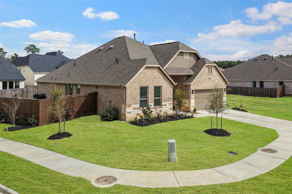 Photo of 29003 Spicewood Valley Drive, New Caney, TX 77357 (MLS # 54363109)