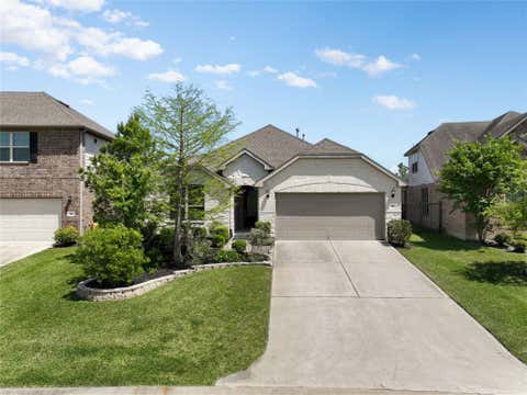 Photo of 67 Pioneer Canyon Place, Tomball, TX 77375 (MLS # 84215103)