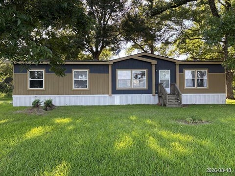 Photo of 409 Fm 2830 Road N, Liberty, TX 77575 (MLS # 25530197)