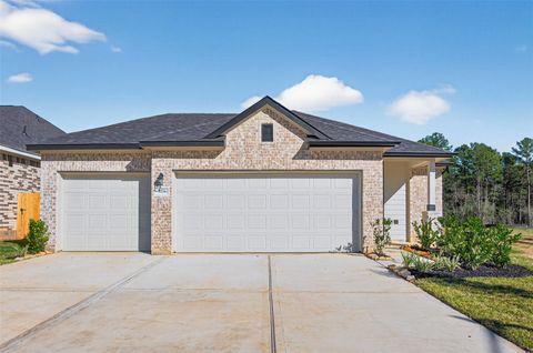 Photo of 9734 Enclave Ridge Road, Willis, TX 77318 (MLS # 77509436)