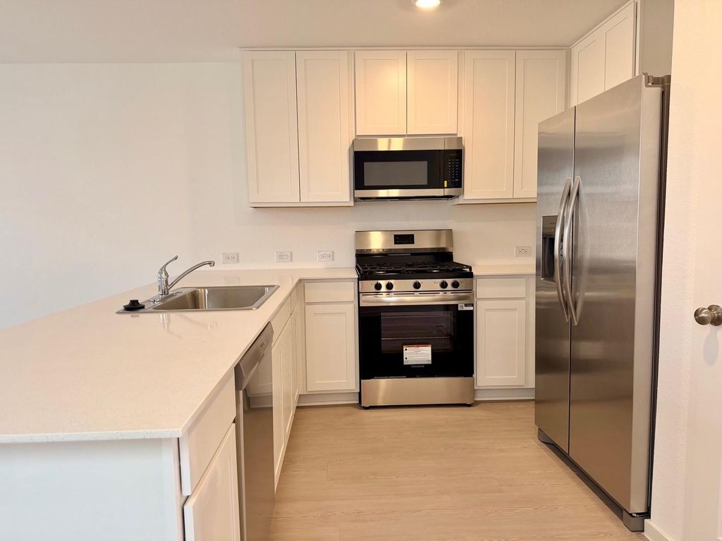 Photo of 921 Pertuso Ln, Huffman, TX 77336 (MLS # 35193292)