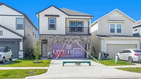 Photo of 14975 Eagle Feather Drive Dr, Houston, TX 77090 (MLS # 20462374)