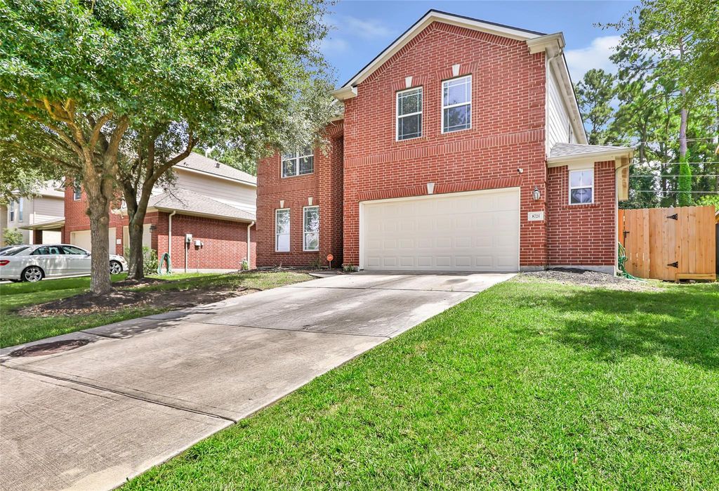 Photo of 8726 Rolling Rapids Road, Humble, TX 77346 (MLS # 74388717)