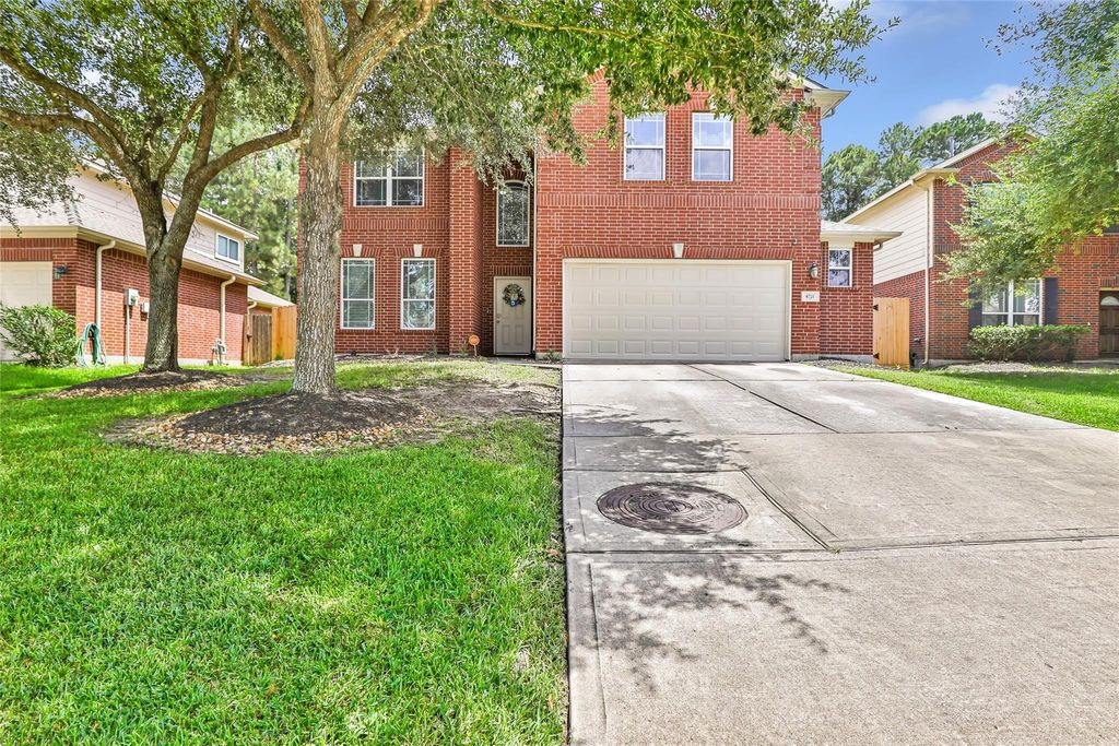 Photo of 8726 Rolling Rapids Road, Humble, TX 77346 (MLS # 74388717)