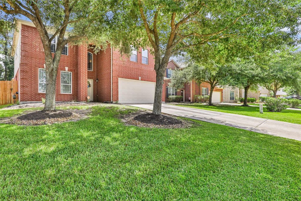 Photo of 8726 Rolling Rapids Road, Humble, TX 77346 (MLS # 74388717)