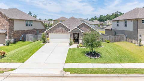 Photo of 7045 Lauren Oak Drive, Conroe, TX 77304 (MLS # 72094706)
