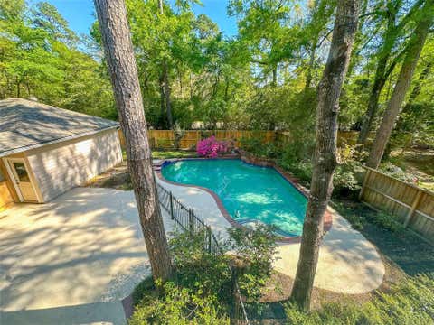 Photo of 11 W Misty Morning Trace, The Woodlands, TX 77381 (MLS # 20884806)