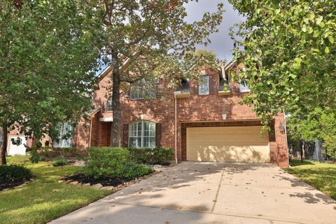 Photo of 95 W Hullwood Circle, The Woodlands, TX 77389 (MLS # 66773550)