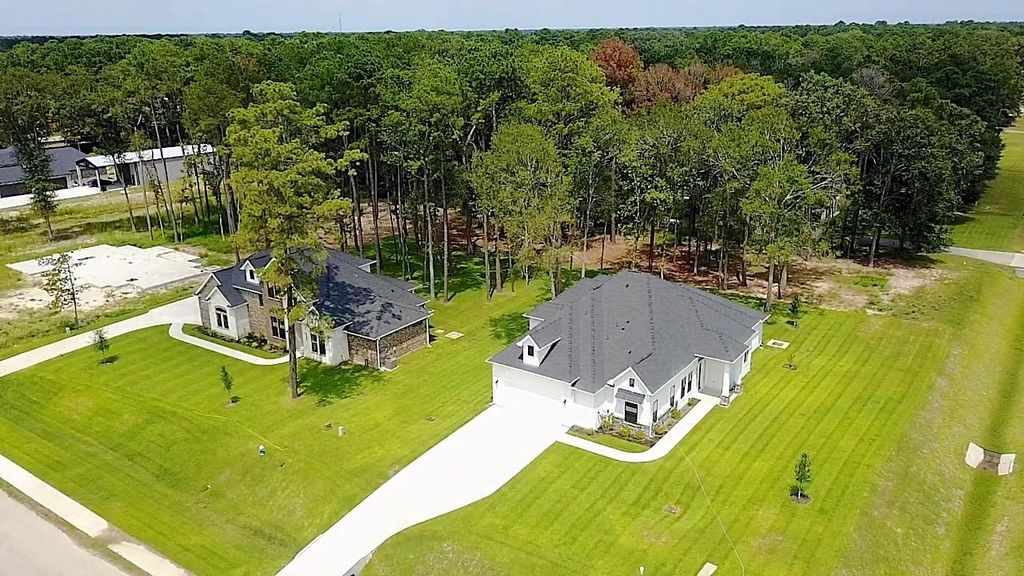 Photo of 28502 Tallow Rock Lane, Huffman, TX 77336 (MLS # 58397470)