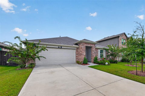 Photo of 14319 Rain Drive, New Caney, TX 77357 (MLS # 9947957)