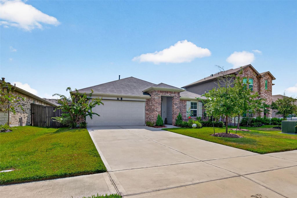 Photo of 14319 Rain Drive, New Caney, TX 77357 (MLS # 9947957)