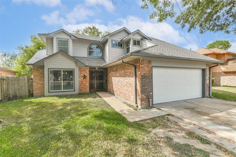 Photo of 13855 Cherry Hollow Ln Lane, Houston, TX 77082 (MLS # 47218020)