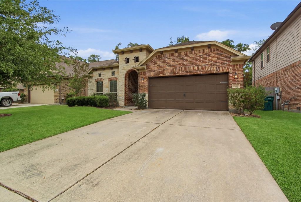 Photo of 23430 Banks Mill Drive Dr, New Caney, TX 77357 (MLS # 23172780)