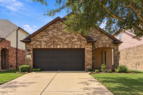 Photo of 8117 E Pine Creek Bend, Cypress, TX 77433 (MLS # 63090905)
