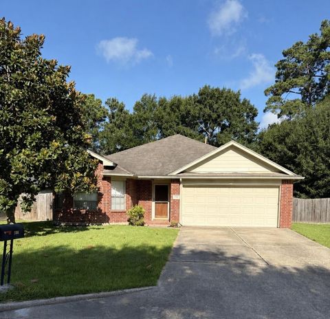 Photo of 264 Indian Falls S Falls S, Conroe, TX 77316 (MLS # 27514150)