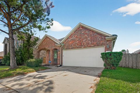 Photo of 16923 Langham Crossing Lane, Houston, TX 77084 (MLS # 67831775)
