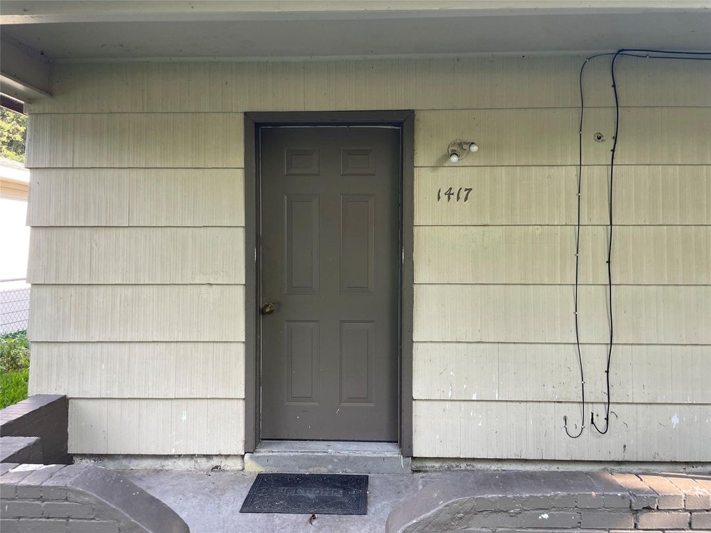 Photo of 1417 W Talmadge Street, Alvin, TX 77511 (MLS # 48869910)