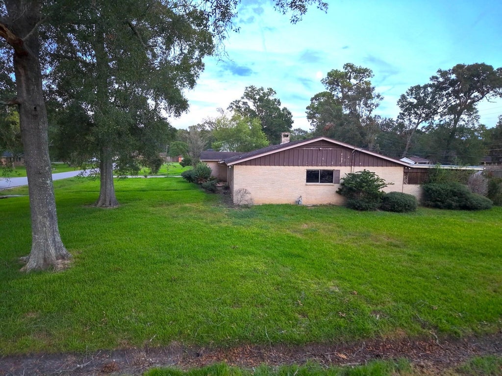 Photo of 7555 Forest Park Drive, Beaumont, TX 77707 (MLS # 26337913)